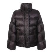 Sacai Down jacket with wide sleeve detail by Sacai. The brand has been...