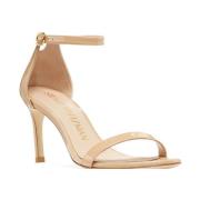 Stuart Weitzman Höj ditt skospel med Nunakedstraight Sandal Beige, Dam