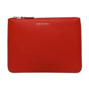 Comme des Garçons Orange Läderclutch Orange, Dam