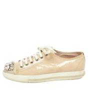 Miu Miu Pre-owned Pre-owned Laeder sneakers Beige, Dam