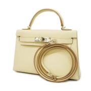 Hermès Vintage Pre-owned Tyg handvskor Beige, Dam