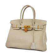 Hermès Vintage Pre-owned Tyg handvskor Beige, Dam