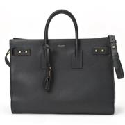 Yves Saint Laurent Vintage Pre-owned Tyg axelremsvskor Black, Dam