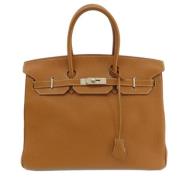 Hermès Vintage Pre-owned Laeder handvskor Yellow, Dam