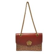 Coach Pre-owned Pre-owned Belagd canvas axelremsvskor Brown, Dam