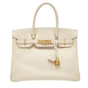 Hermès Vintage Pre-owned Laeder handvskor Beige, Dam