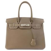 Hermès Vintage Pre-owned Laeder handvskor Beige, Dam