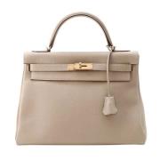 Hermès Vintage Pre-owned Laeder handvskor Beige, Dam