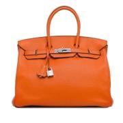 Hermès Vintage Pre-owned Laeder handvskor Orange, Dam