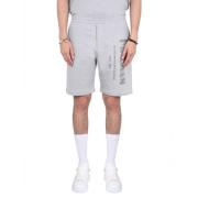 Alexander McQueen Bermuda Shorts med Graffiti Logo Print Gray, Herr