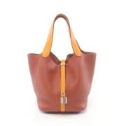 Hermès Vintage Pre-owned Laeder handvskor Orange, Dam