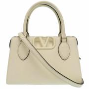 Valentino Vintage Pre-owned Laeder handvskor Beige, Dam