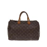 Louis Vuitton Vintage Pre-owned Canvas handvskor Brown, Dam