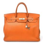 Hermès Vintage Pre-owned Laeder handvskor Orange, Dam