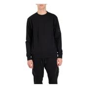 C.p. Company Bomull crewneck sweatshirt med broderat logotyp Black, He...