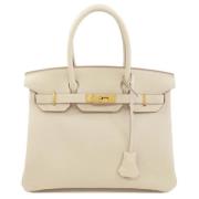 Hermès Vintage Pre-owned Tyg handvskor Beige, Dam