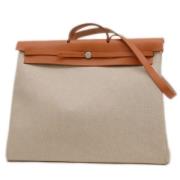 Hermès Vintage Pre-owned Canvas handvskor Beige, Dam