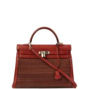 Hermès Vintage Pre-owned Canvas handvskor Red, Dam