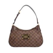 Louis Vuitton Vintage Pre-owned Canvas axelremsvskor Brown, Dam