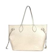 Louis Vuitton Vintage Pre-owned Tyg totevskor Beige, Dam