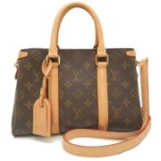 Louis Vuitton Vintage Pre-owned Canvas handvskor Brown, Dam