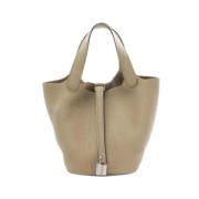 Hermès Vintage Pre-owned Laeder handvskor Beige, Dam