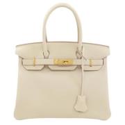 Hermès Vintage Pre-owned Laeder handvskor Beige, Dam