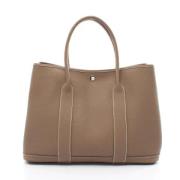 Hermès Vintage Pre-owned Laeder handvskor Beige, Dam