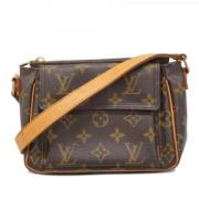 Louis Vuitton Vintage Pre-owned Tyg axelremsvskor Brown, Dam