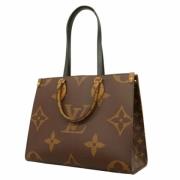 Louis Vuitton Vintage Pre-owned Tyg totevskor Brown, Dam