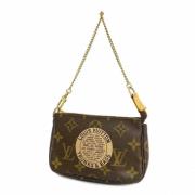 Louis Vuitton Vintage Pre-owned Tyg kuvertvskor Brown, Dam