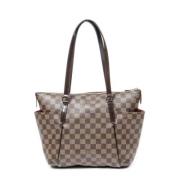 Louis Vuitton Vintage Pre-owned Belagd canvas axelremsvskor Brown, Dam