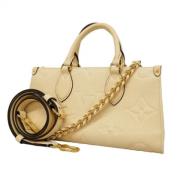 Louis Vuitton Vintage Pre-owned Tyg handvskor Beige, Dam