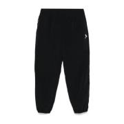 66 North Svarta vattenavvisande track pants Black, Herr