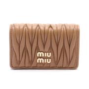 Miu Miu Pre-owned Pre-owned Laeder hem-och-kontorstillbehr Brown, Dam