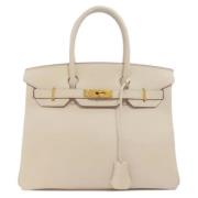 Hermès Vintage Pre-owned Laeder handvskor Beige, Dam