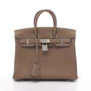 Hermès Vintage Pre-owned Laeder handvskor Beige, Dam