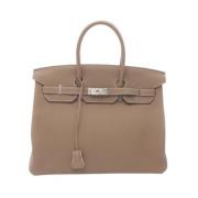 Hermès Vintage Pre-owned Laeder handvskor Beige, Dam