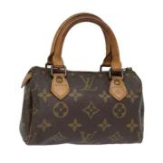 Louis Vuitton Vintage Pre-owned Canvas handvskor Brown, Dam