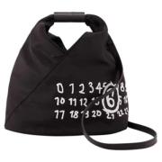 Maison Margiela Plast handvskor Black, Dam