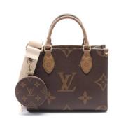 Louis Vuitton Vintage Pre-owned Plast handvskor Beige, Dam