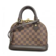 Louis Vuitton Vintage Pre-owned Tyg handvskor Brown, Dam