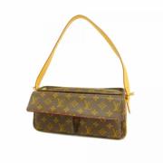 Louis Vuitton Vintage Pre-owned Tyg axelremsvskor Brown, Dam