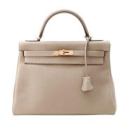 Hermès Vintage Pre-owned Laeder handvskor Beige, Dam