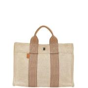 Hermès Vintage Pre-owned Canvas handvskor Beige, Dam