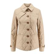 Burberry Quiltad jacka med rutmönstrad foder Beige, Dam