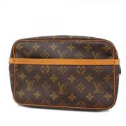 Louis Vuitton Vintage Pre-owned Tyg kuvertvskor Brown, Dam