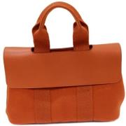 Hermès Vintage Pre-owned Laeder handvskor Orange, Dam