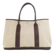 Hermès Vintage Pre-owned Canvas handvskor Beige, Dam