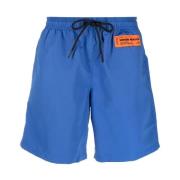 Heron Preston Snabbtorkande badshorts för män Blue, Herr